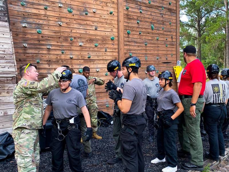On Jun. 12, Explorers from St. Johns County SO, Putnam County SO, Flagler County SO, Jacksonville SO, and Bradford County SO conducted training together at CBJTC (Camp Blanding Joint Training Center) with the FLARNG (FL Army National Guard) to Rappel off of a 60-foot tall tower and exercised their physical agility & team-building skills through the Air Assault Obstacle Course.