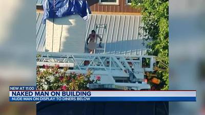 Naked man climbs on roof of St. Augustine business