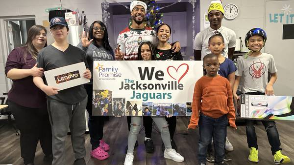 Jacksonville Jaguar, Andre Cisco, delivers $3,000 worth of gifts for Family Promise shelter