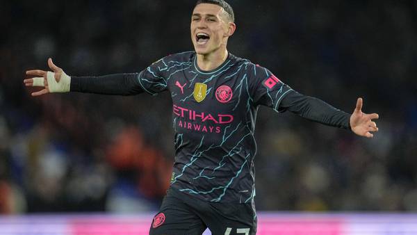 Man City beats Brighton 4-0 to stay on course for another Premier League title. Phil Foden scores 2