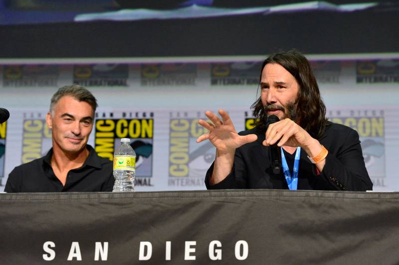 SAN DIEGO, CALIFORNIA - JULY 22: (L-R) Chad Stahelski and Keanu Reeves speak onstage during "Collider": Directors On Directing Panel At Comic-Con at San Diego Convention Center on July 22, 2022 in San Diego, California. (Photo by Jerod Harris/Getty Images for Lionsgate)