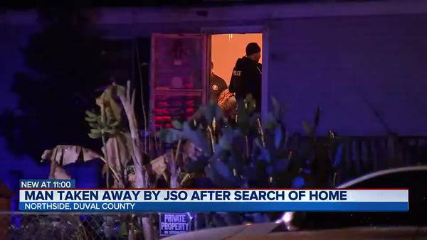 Man taken away by JSO after search of home
