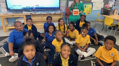 Action News Jax’s Chandler Morgan reads to students at Guardian Catholic School