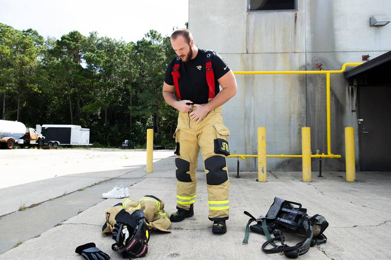 Jags' center Luke Fortner spent time with JFRD, seeing what it was like to gear up.