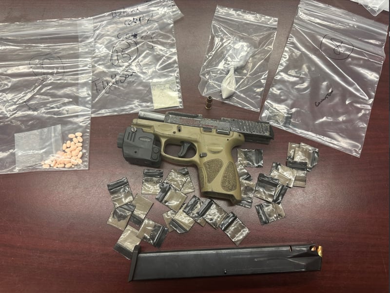 In addition to fentanyl, meth, and pills, a gun was also found by investigators at the drug house.