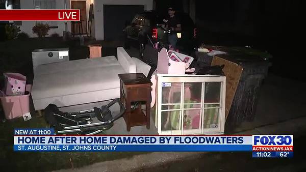 Home after home damaged by flooding