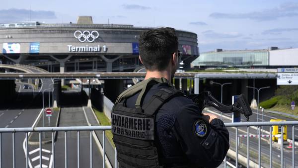 Massive policing for Paris Olympics to include security checks for some of the capital's residents