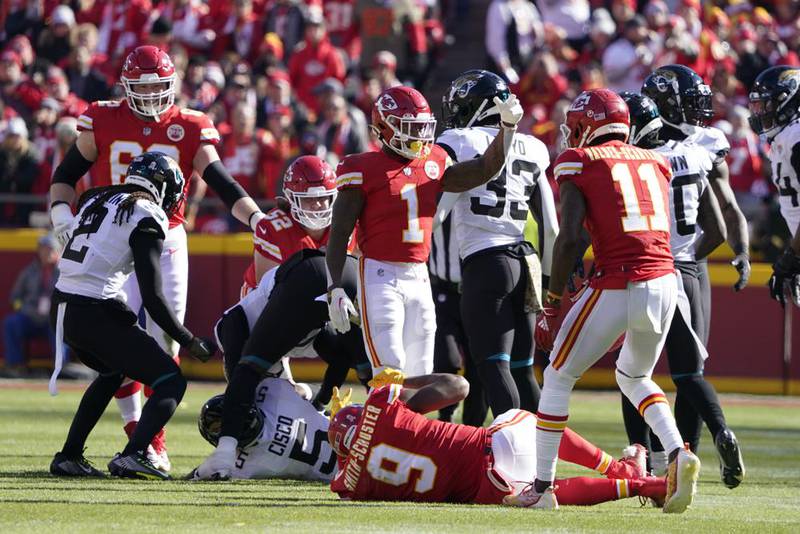 Kansas City Chiefs wide receiver JuJu Smith-Schuster (9) rolls on the field after being injured during the first half of an NFL football game against the Jacksonville Jaguars Sunday, Nov. 13, 2022, in Kansas City, Mo.