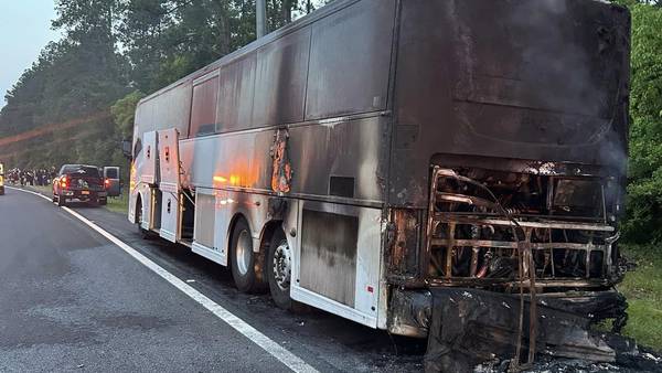 Photos: Charter bus catches fire on I-10