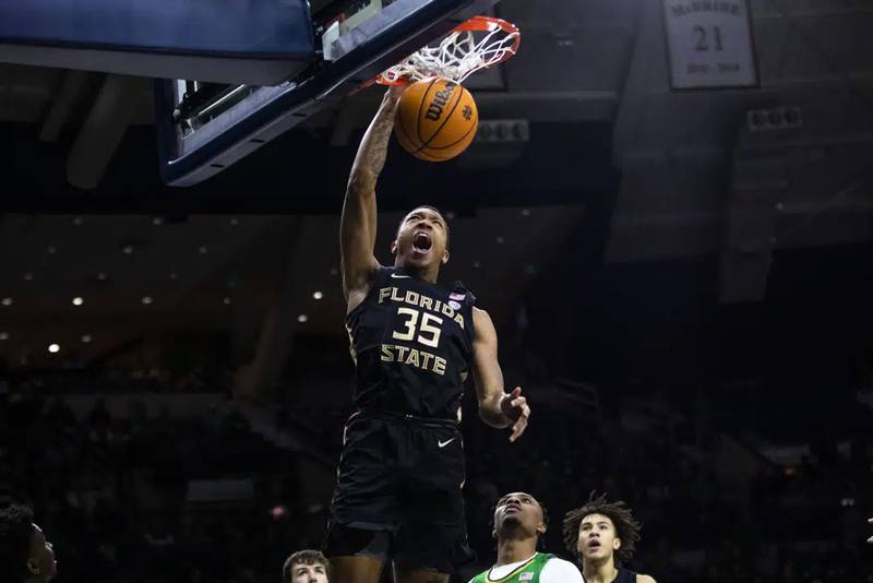 Florida State's Matthew Cleveland (35) dunks during the first half of the team's NCAA college basketball game against Notre Dame on Tuesday, Jan. 17, 2023, in South Bend, Ind.