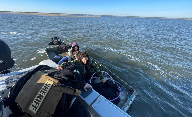 NCSO marine unit helps rescue couple and their dog.