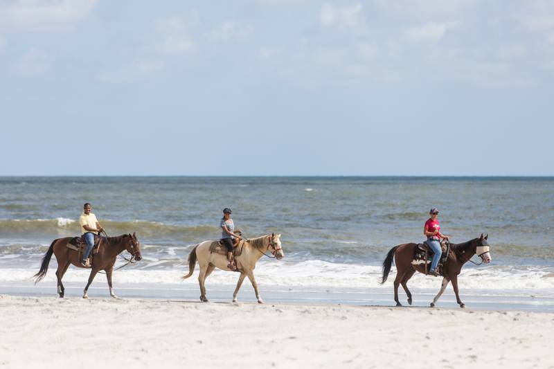 Amelia Island offers more than just sun bathing. Horse riding on the beach anyone?