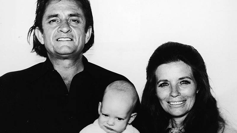 UNDATED:  (FILE PHOTO)  Country musicians Johnny Cash and his wife June Carter Cash hold their infant son John Carter Cash in a promotional portrait for the film "A Gunfight," directed by Lamont Johnson in this photo from 1970. Johnny Cash died September 12, 2003 in a hospital in Nashville, Tennessee while being treated for a stomach complaint. He was 71. (Photo by Paramount Pictures/Getty Images)