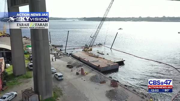 Crane on barge next to Hart Bridge falls into St. Johns River; bridge reopens