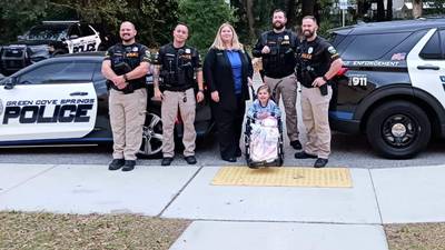 Photos: A special girl got to spend time with her favorite police department 