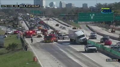 Tractor-trailer crashes into concrete wall, spills fuel in crash on I-10