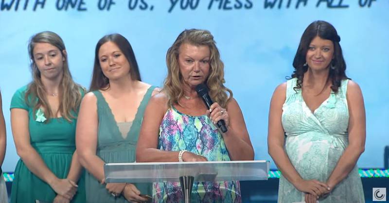 Tracie Hartkemeyer, owner of Infinity Allstars gym, where Tristyn Bailey cheered, speaks at the teen's memorial service at Celebration Church in Jacksonville on May 18, 2021.