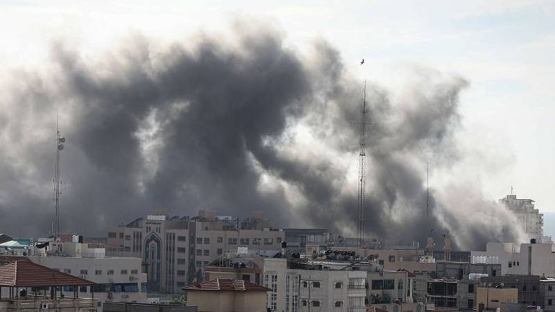 GAZA CITY, GAZA - OCTOBER 07: Smoke rises as the clashes between Palestinian groups and Israeli forces continue in Gaza City, Gaza on October 07, 2023. At least 198 people killed, 1,610 others injured in Israeli attacks on Gaza, according to Gaza Strip's Health Ministry. (Photo by Mustafa Hassona/Anadolu Agency via Getty Images)