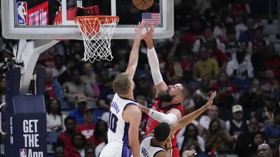Ingram, Valanciunas lift Zion-less Pelicans past Kings and into the playoffs