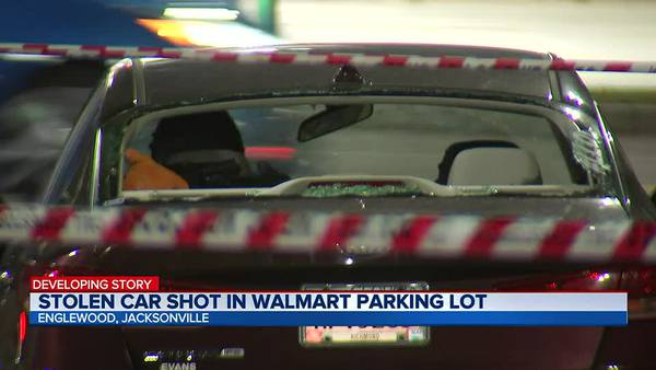 Stolen car shot un Walmart parking lot