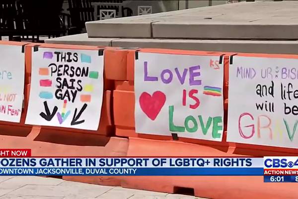 Dozens gather in support of LGBTQ+ rights