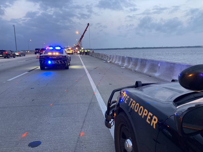 The 23-year-old FDOT driver rear-ended the Toyota, causing it to travel onto the right shoulder and strike the concrete wall. The Toyota then traveled over the wall and into the water below.