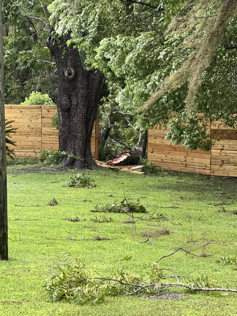 A fence shows storm damage in Bradford.