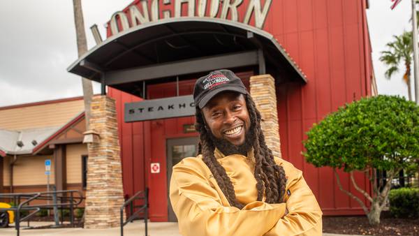 Grill master from Longhorn Steakhouse in St. Augustine is honored for grilling one million steaks