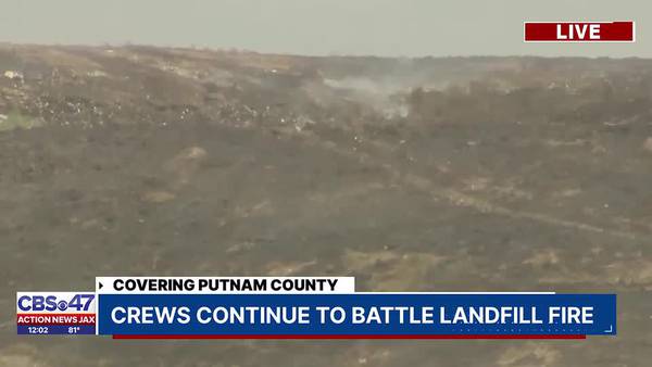 Firefighters monitor hot spots after a large fire at Putnam County landfill