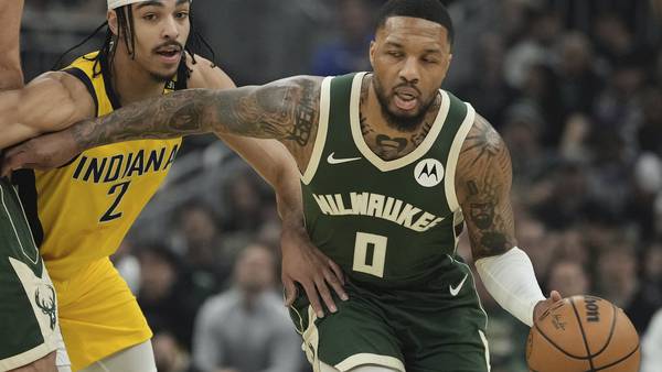 Damian Lillard's 35-point 1st half helps Bucks beat Pacers 109-94 without Giannis in playoff opener