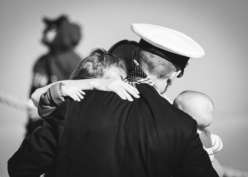 A warm embrace as navy families finally reunite with their loved ones.
