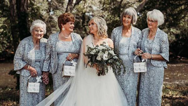 Bride's grandmothers serve as flower girls at her wedding