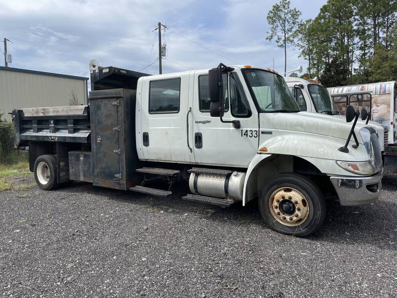 This 2013 International Crew Cab dump truck comes with the crew cab for extra hands on deck.