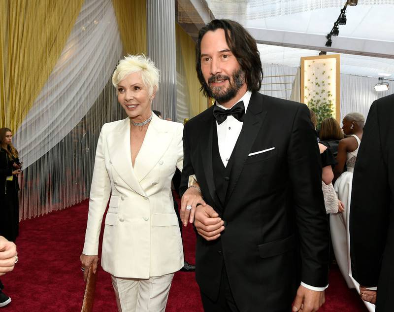 HOLLYWOOD, CALIFORNIA - FEBRUARY 09: Patricia Taylor and Keanu Reeves attend the 92nd Annual Academy Awards at Hollywood and Highland on February 09, 2020 in Hollywood, California. (Photo by Kevork Djansezian/Getty Images)
