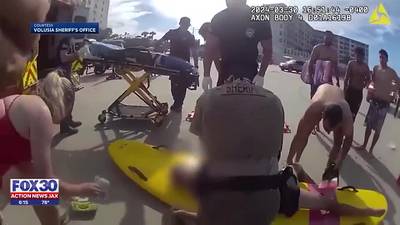 WATCH: Volusia Sheriff shares body-cam video of first responders rescuing lifeless man from surf
