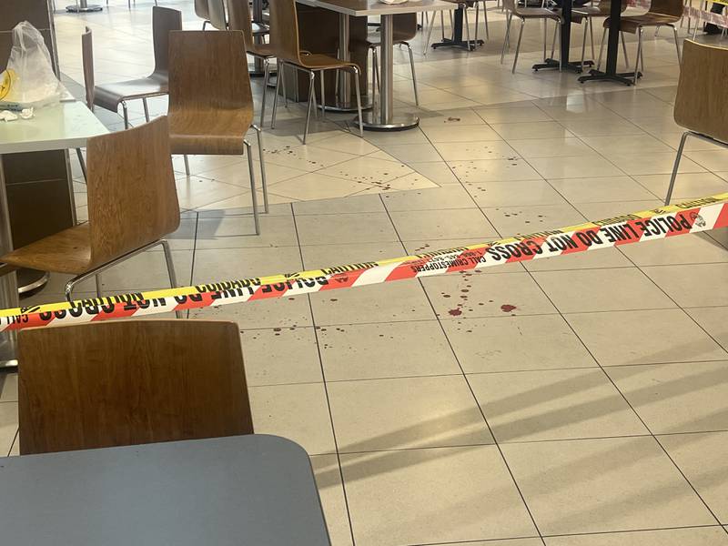 Blood could be seen on the floor in the food court of the Avenues Mall on Friday, Dec. 1, 2023.