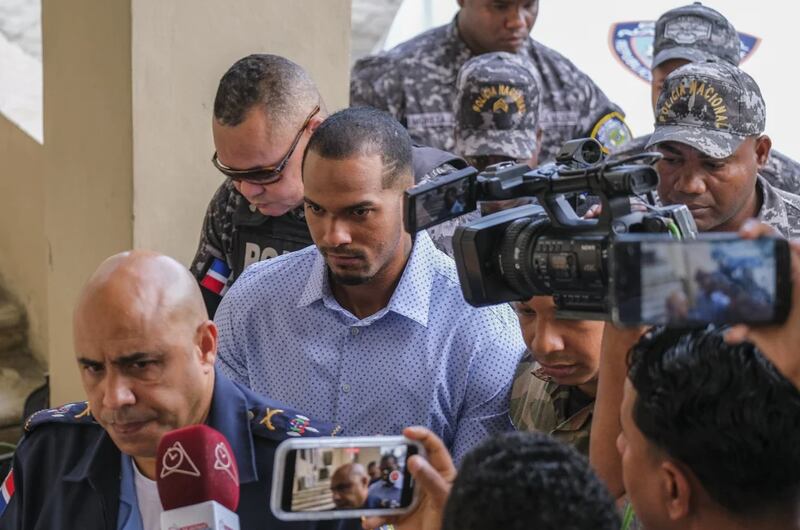 FILE - Tampa Bay Rays shortstop Wander Franco, center, is escorted by police to court in Puerto Plata, Dominican Republic, Jan. 5, 2024. Dominican prosecutors formally accused Franco on Tuesday, July 9, 2024, of sexual abuse against a 14-year-old girl. (AP Photo/Ricardo Hernandez, File)