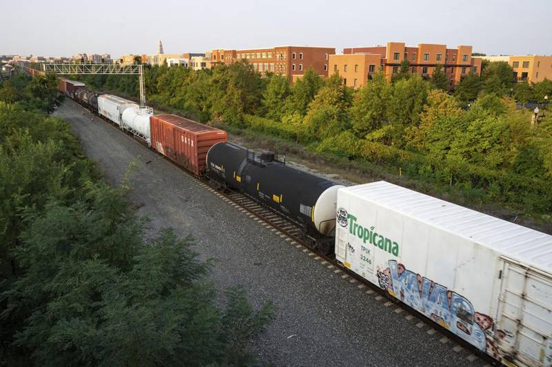 A CSX freight train travels through Alexandria, Va. on Thursday, Sept. 15, 2022. President Joe Biden said Thursday that a tentative railway labor agreement has been reached, averting a strike that could have been devastating to the economy before the pivotal midterm elections.