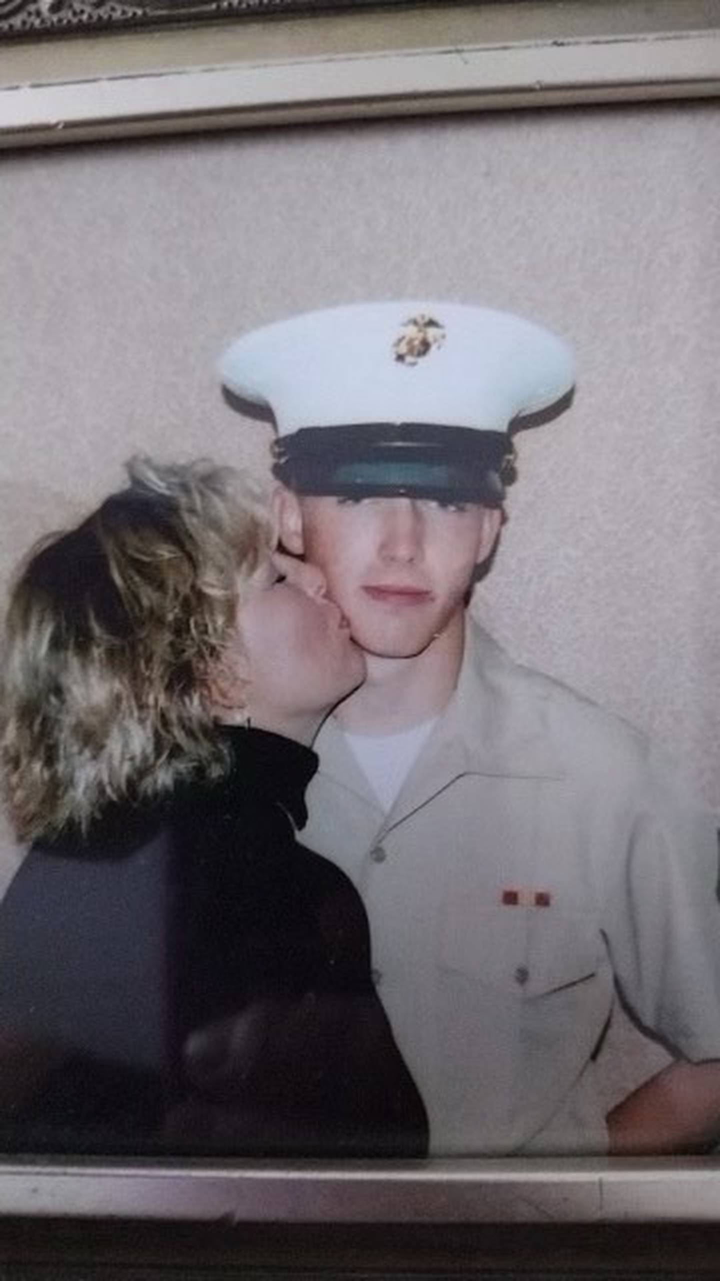 Patrick McDowell, who was 20 at the time this photo was taken, and his mom.