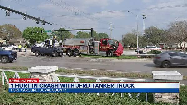Man helps unconscious driver out of a burning car that collided with JFRD truck