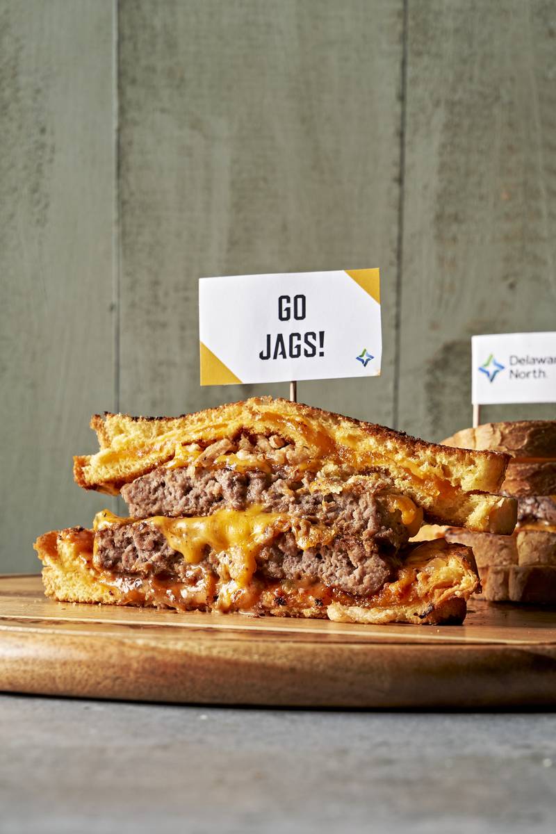 Grilled Cheese Cheeseburger: Two ¼-pound hamburger patties sandwiched between two grilled cheeses, topped with crispy onions and special house sauce. Available at Tailgate Grill (lower level).