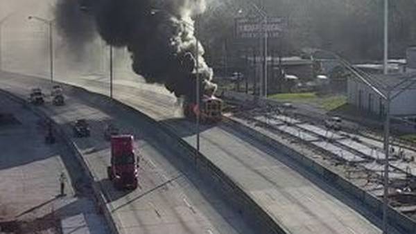 School bus fire closes I-10 at Cassat Ave, no injuries