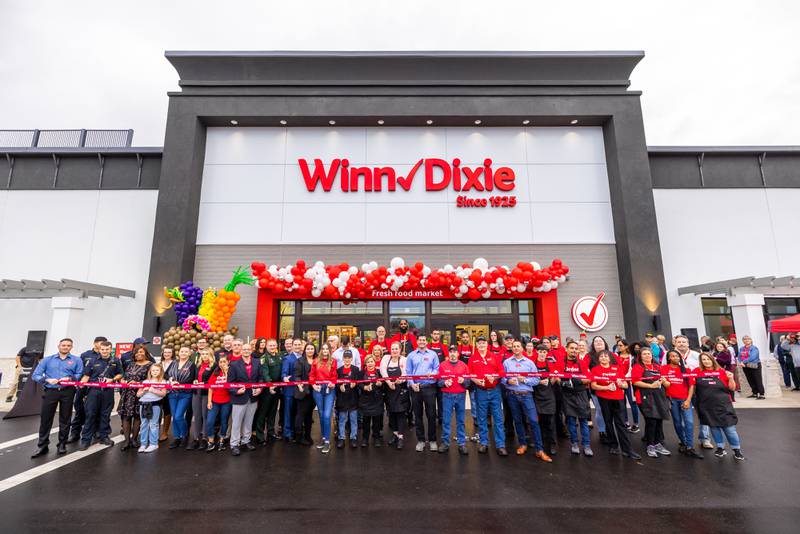 Ribbon cutting ceremony before the doors opened at Grand Cypress location on Wed., Dec. 14.