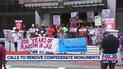 Protesters rally against standing Confederate monuments during Jacksonville bicentennial celebration