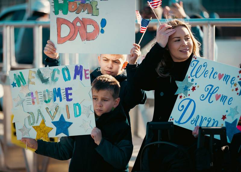 Families eagerly await their loved ones return home at Naval Station Mayport from an eight-month deployment.