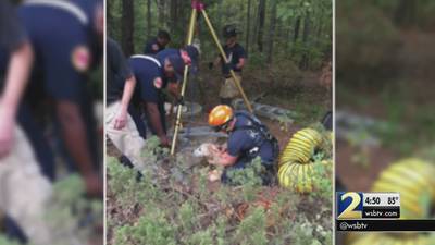 Firefighters rescue dog stuck at bottom of well