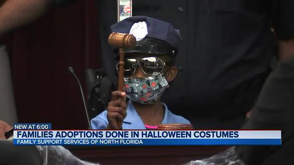 Family adoptions done in Halloween costumes