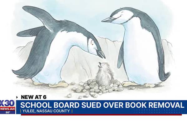 School board sued over book removal