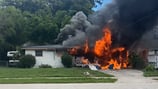 Jacksonville man runs into burning home to rescue elderly woman