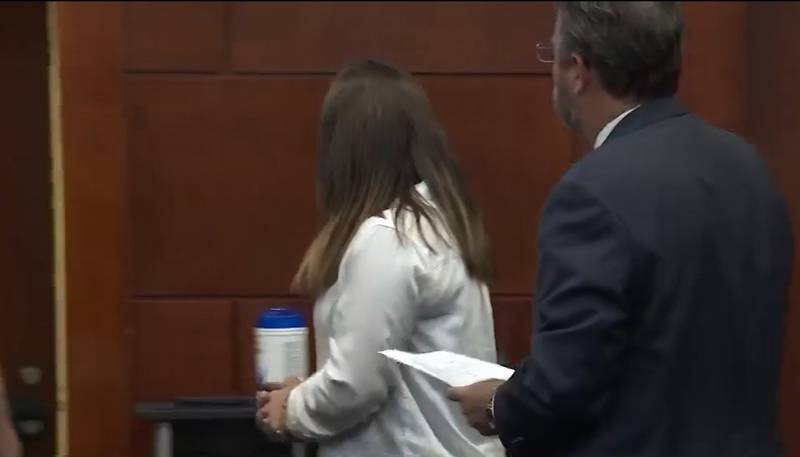 Crystal Smith leaves court in handcuffs to serve a 30-day jail sentence. She pleaded no contest to evidence tampering in the murder of Tristyn Bailey.